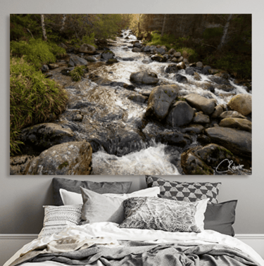 Canvas Print of Autumnal River flowing over rocks