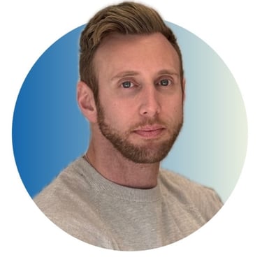 A professional headshot of Bryce North, founder of Don't Be A Little Pitch, smiling in a grey shirt