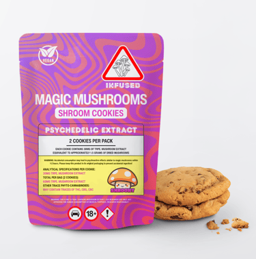 A purple pouch of Magic Mushrooms Shroom Cookies with psychedelic extract next to two chocolate chip cookies.