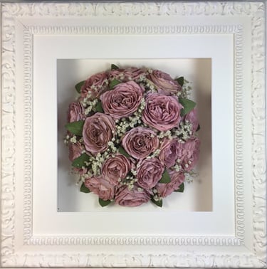 Perfectly round Birdseye view preserved wedding bouquet in a frame