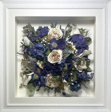 Blue Birdseye view preserved wedding bouquet with white calla Lillies in a frame