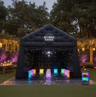 a party tent with a stage set up for a party