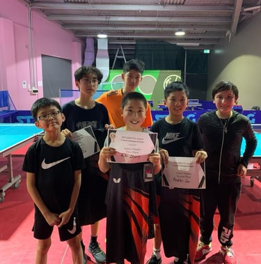 Children displaying their prizes