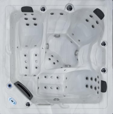 a hot tub with a white tub and a blue sky background