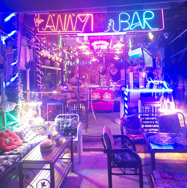 Outside view of Anny Bar under neon lights on Soi 94, Hua Hin