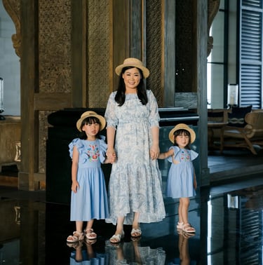 family-reflection Family portrait with reflections inside the Grand Lobby at The Apurva Kempinski Bali