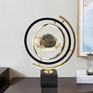Modern abstract sculpture for living room decor, black and gold centerpiece.