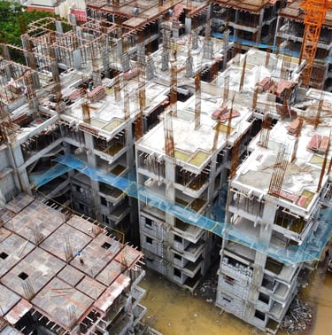 a building being built into a building with a crane
