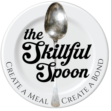 A silver spoon laying across a white plate the words, "The Skillful Spoon" written across the front