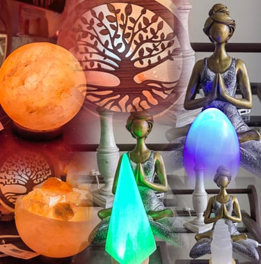 a collection of various hymalayan salt lamps and selenite lamos and fluorite lamps