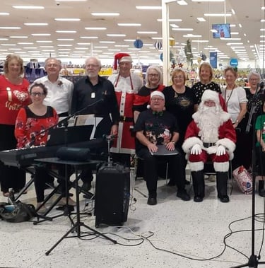 The District Singers perform at Menai Central