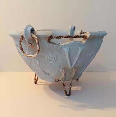 A clickable link leading to a page with further information about the sculpture 'Votum'