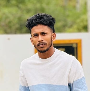 Basil K M