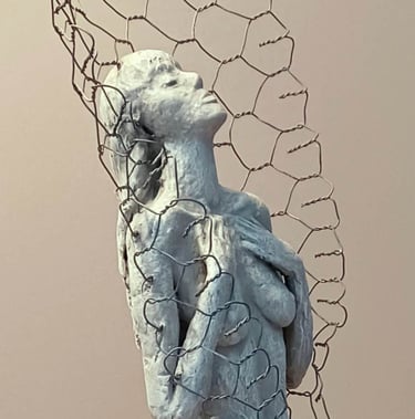 A clickable link leading to a page with further information about the sculpture 'Solitude'