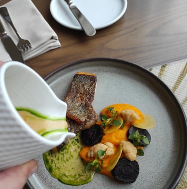 grilled fish with carrot puree and split butter sauce