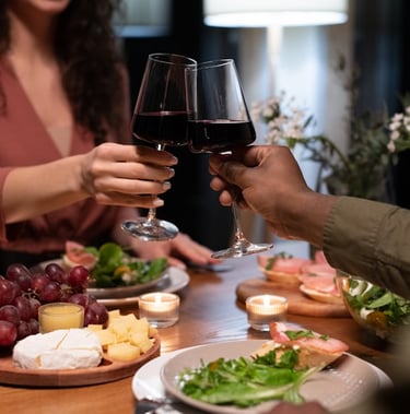couples toasting wine
