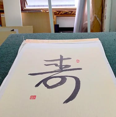 Mounting of Chinese Calligraphy in our Kuala Lumpur framing studio