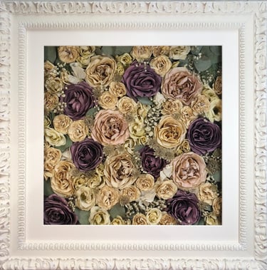 a flower wall style preserved wedding bouquet in an ornate frame