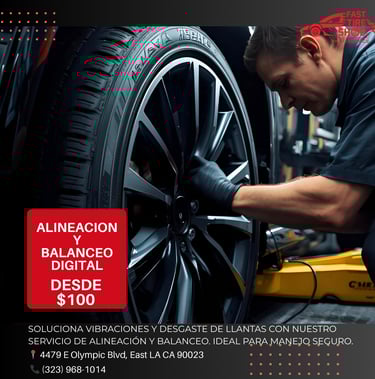 Mechanic performing digital tire alignment and balancing at Fast Tire Shop East Los Angeles