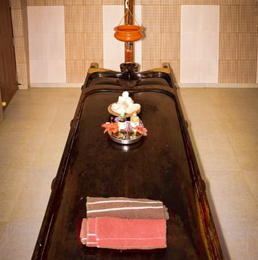 Beautifully designed cottages at Karapuzha Resorts, featuring traditional architecture with modern a