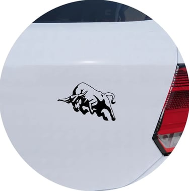 Black charging bull vinyl decal sticker applied to the trunk of a white car.