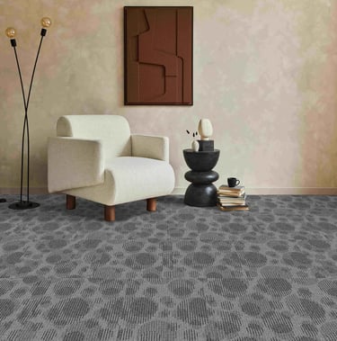 Living room with grey carpet tiles in an organic bubble pattern - ideal for offices