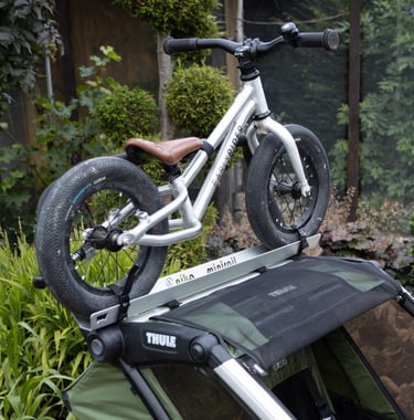 Thule-Fahrradanhaenger-Laufrad-Kinderfahrrad-Befestigung-Halterung-Spazieren-Woom-Early Rider-Pucky
