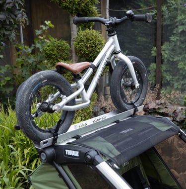 Thule-Fahrradanhaenger-Laufrad-Kinderfahrrad-Befestigung-Halterung-Spazieren-Woom-Early Rider-Pucky