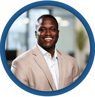 a man in a suit and tie smiling