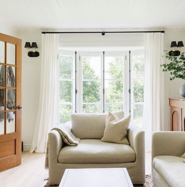 a living room with a couch and a coffee table