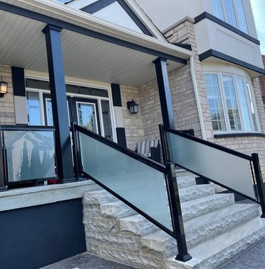 frosted glass railings with columns in driveway