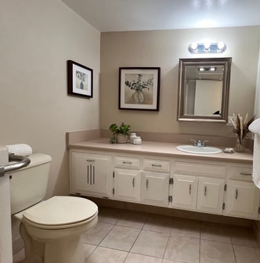 After staging: a bathroom with a toilet and a sink