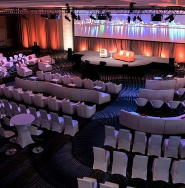 a large room with a stage and a stage