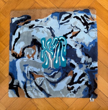 Teppich mit abstrakten Pferden abgebildet in Blautönen