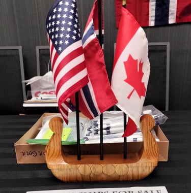 viking ship centerpiece with American, Canadian and Norwegian flags