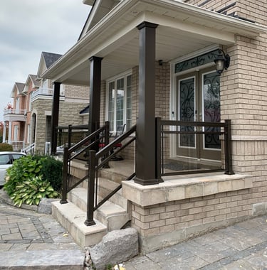 front porch with brown collumns improve the look of the house