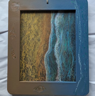 Refurbished framed chalkboard. New chalk art of beach and surf with framed painted with shells and 3D water surf.