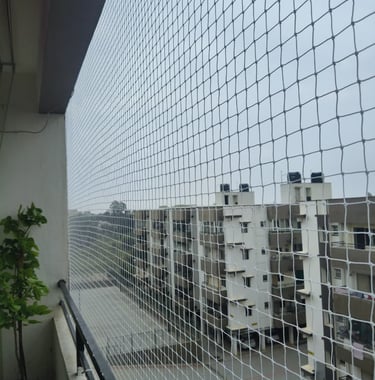 a balcony with a view of a city skyline