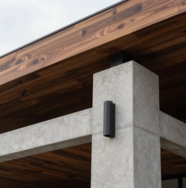 Elegant close-up photography of a modern architectural structure in Tamarindo, focusing on clean lines, high-end materials like teak wood and concrete, soft tropical light, Central American / Costa Rican design, charcoal and light gray tones.