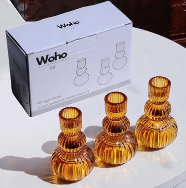 Vintage-style amber glass taper candle holders with ribbed design perfect for autumn or retro home