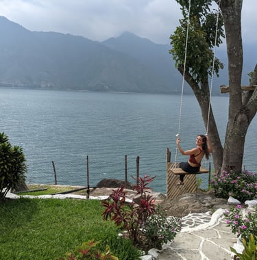 playing with a swing on Lake Atitlan, Guatemala