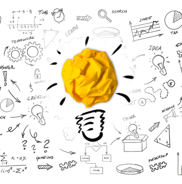 a yellow crumpled paper ball with a light bulb inside