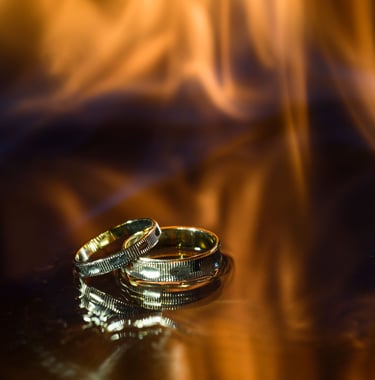 two wedding rings with two wedding rings on them