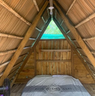 Wooden tipi cabins at camping babsita