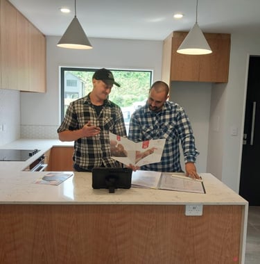Terence and Denym in a kitchen
