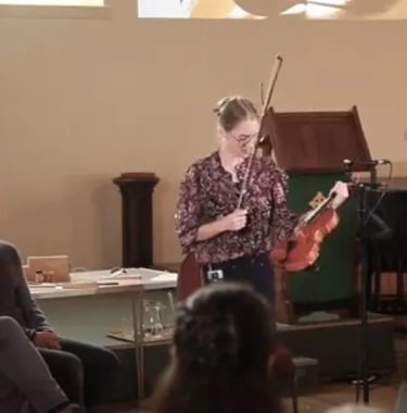 Charlotte Rowan, violinist giving talk on violin making for Orkney International Science Festival