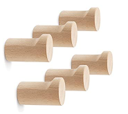 a bunch of wooden pegs with a white background