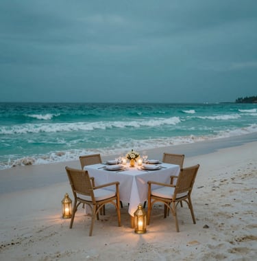 High-end travel photography of a private dinner set up on a secluded beach at twilight. Soft pale aqua waves lap the shore under a deep teal sky. A single table with gold accents and lanterns.