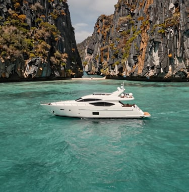 Photography of a luxury yacht anchored in a secluded turquoise bay with high cliffs, Latin American region, bright daylight, water texture in muted teal and off-white.