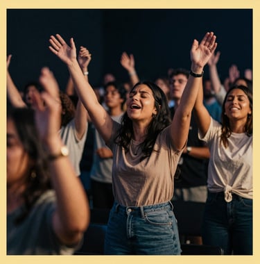 A vibrant, modern photograph of a ministry event, showing spiritual energy and community. High-end lighting with deep navy shadows (#0D131C) and warm golden highlights (#D8B863). People are engaged in intense, joyful worship.